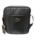 Bolso bandolera Jaguar 7814PE negro vista frontal con logo metálico y pespuntes blancos