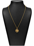 Collar Asteria de acero dorado con árbol de la vida y detalles de colores de los siete chakras