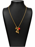 Collar Azalea dorado de mujer con corazón dorado abierto, estrella y corazón rojo