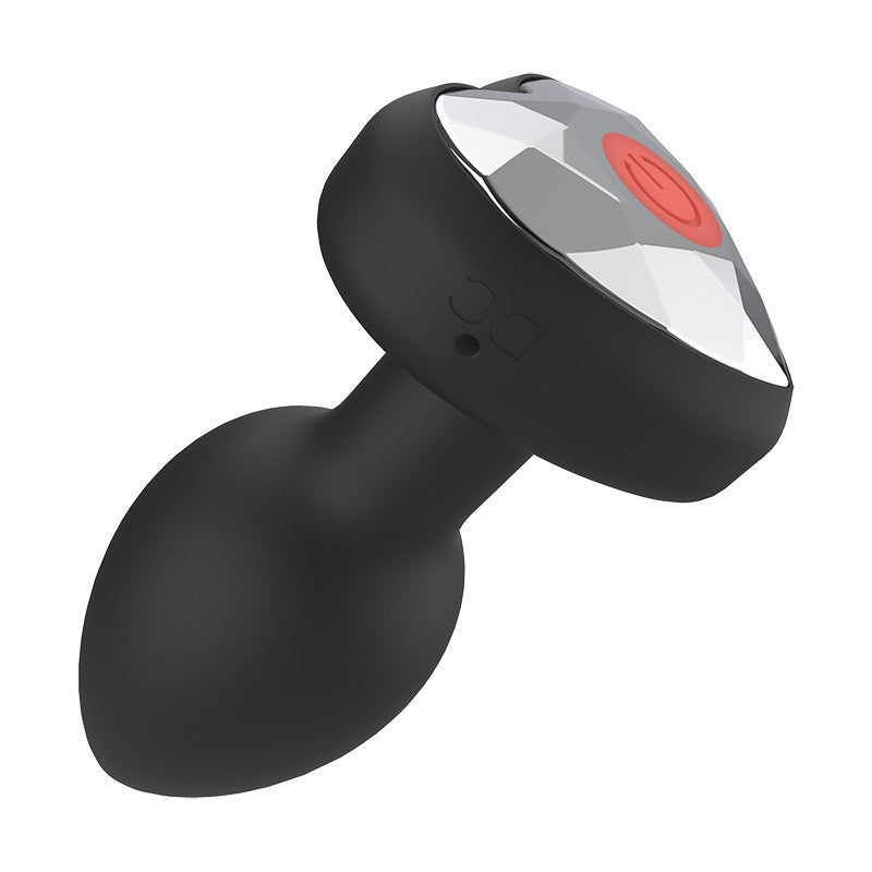 Plug Vibrador con Luz de Silicona Negra Control Remoto Recargable 10 modos